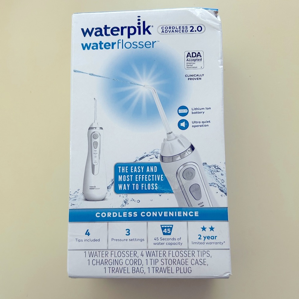 New in Box, Waterpik water flosser cordless advanced 2.0
